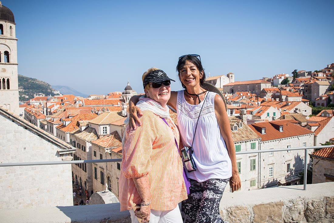 ZMPD - Pax smiling overlooking skyline in Dubrovnik, Croatia 