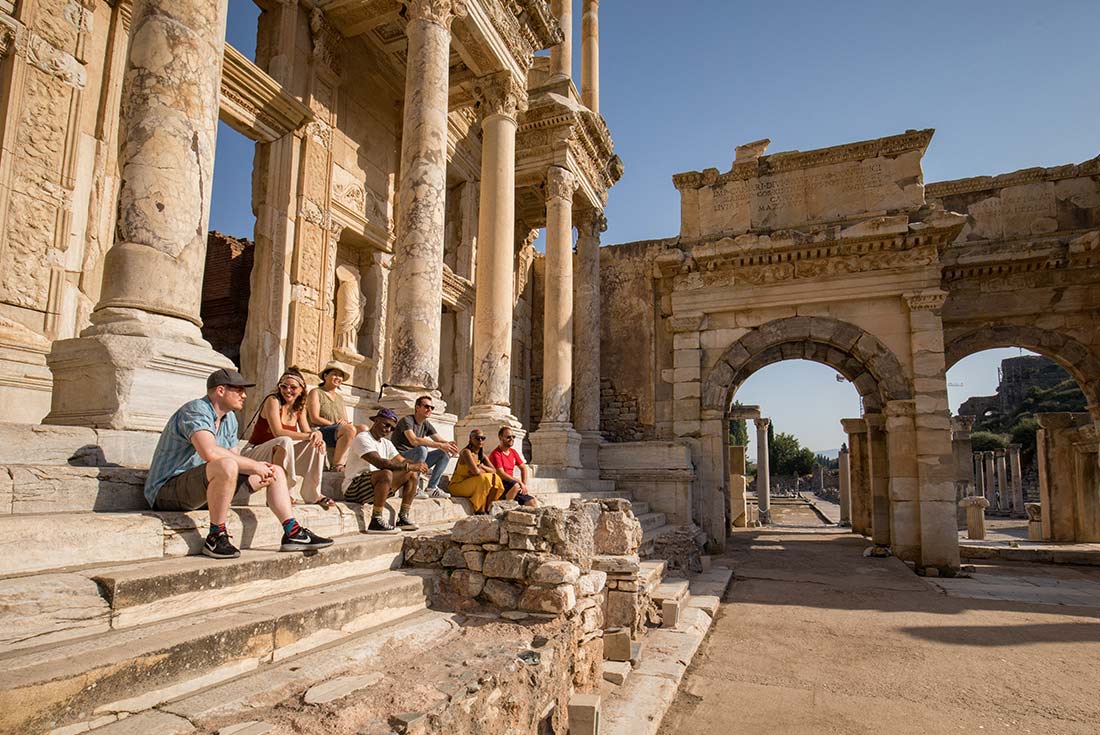 Group of travellers exploring Ephesus ancient city, Turkey