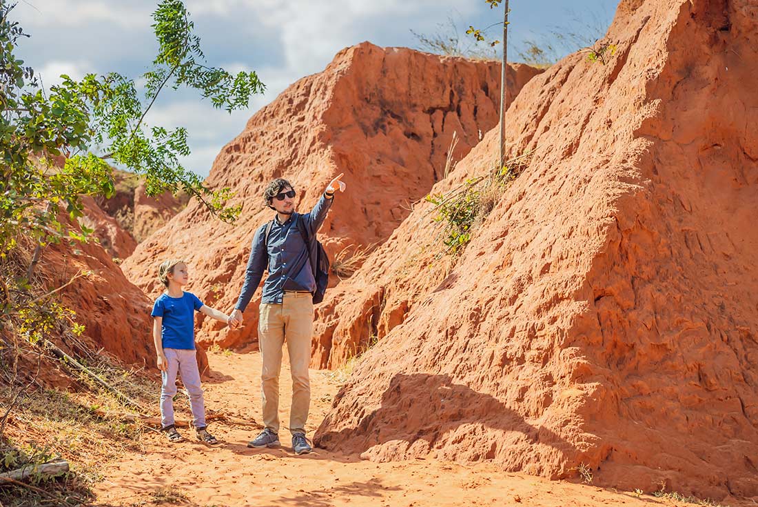 Father and son exploring Australia's Red Centre, Australian Outback
