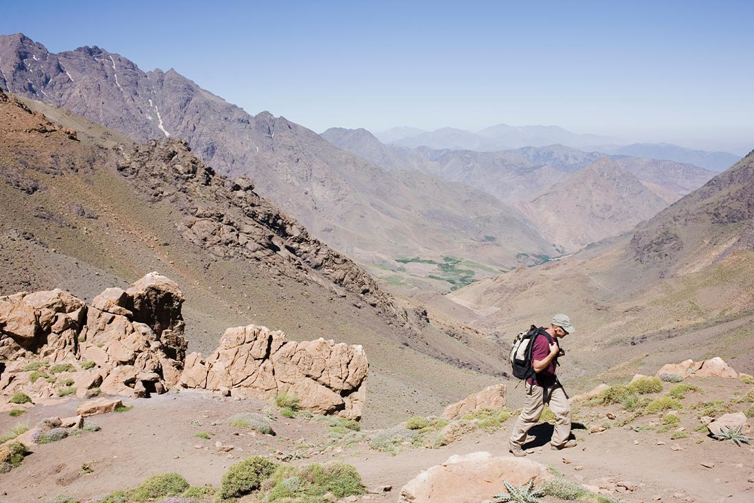 Traveller hiking in the High Atlas Mountains, M'goun Valley, Morocco