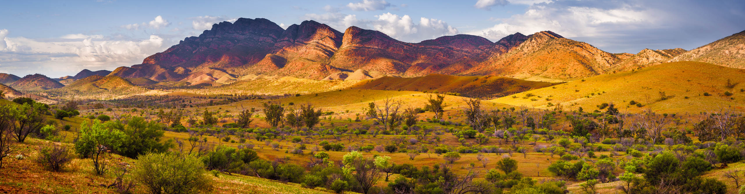 Sunset over the Flinders Ranges, with the mountains glowing red and orange, South Australia