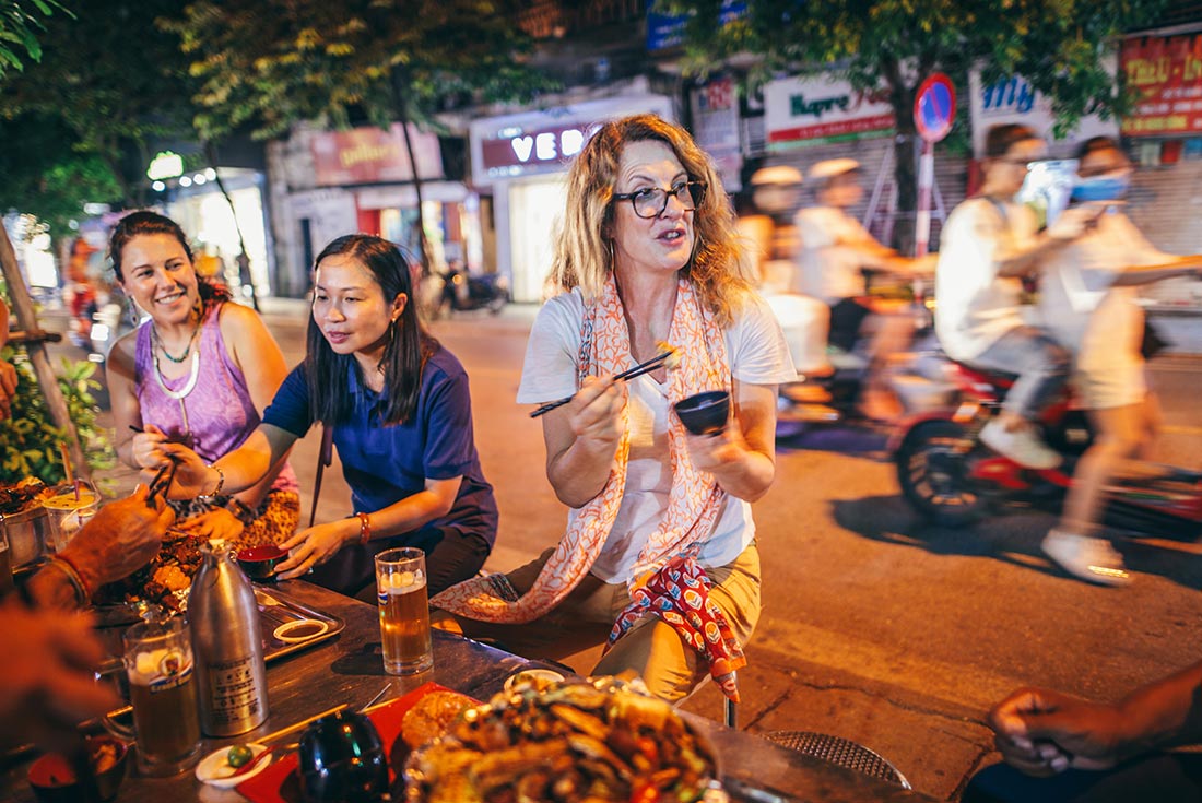 Vietnam snapshot with Intrepid Travel: Sample local food at a street market