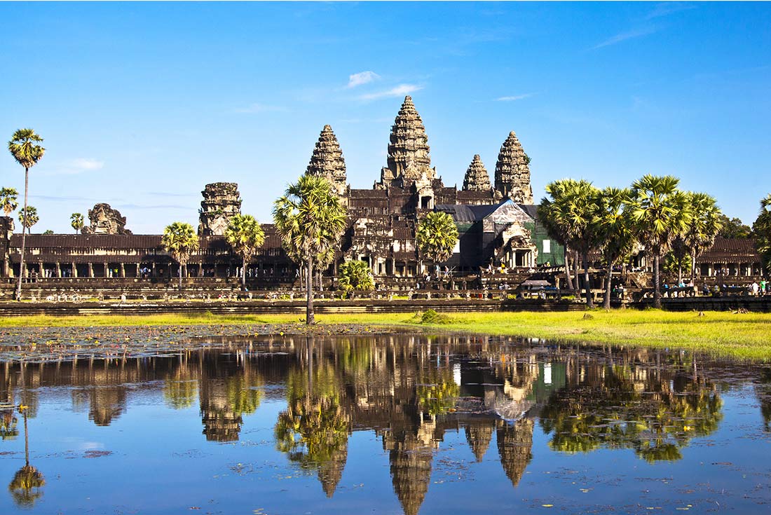 TKPC - View of Angkor Wat across lake on a sunny day