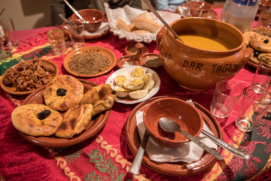 Enjoying a home cooked meal in Aroumd, High Atlas Mountains, Morocco
