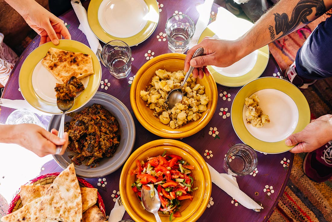 Group eating traditional food in Morocco