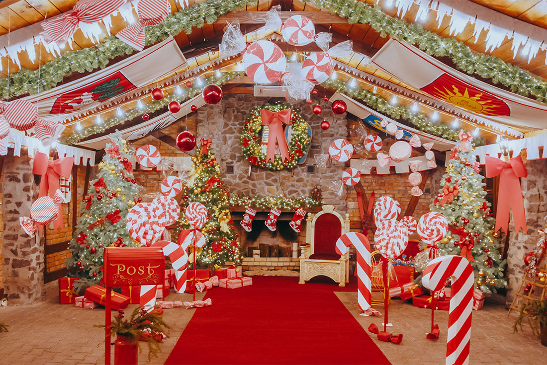 Interior of Santa's village with mailbox, decorated with christmas ornaments