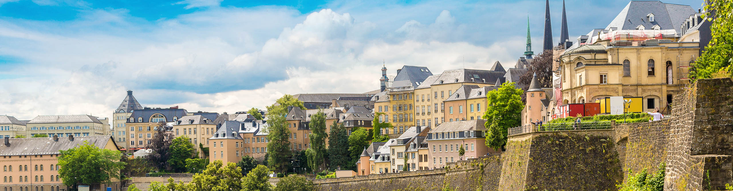  Aerial view of Luxembourg on a sunny day with a few clouds in the sky