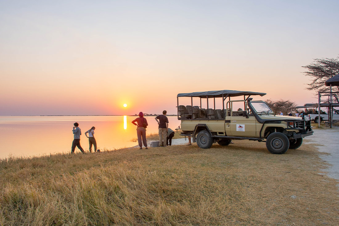 UBPB - Travellers watching sunset at Chobe NP 