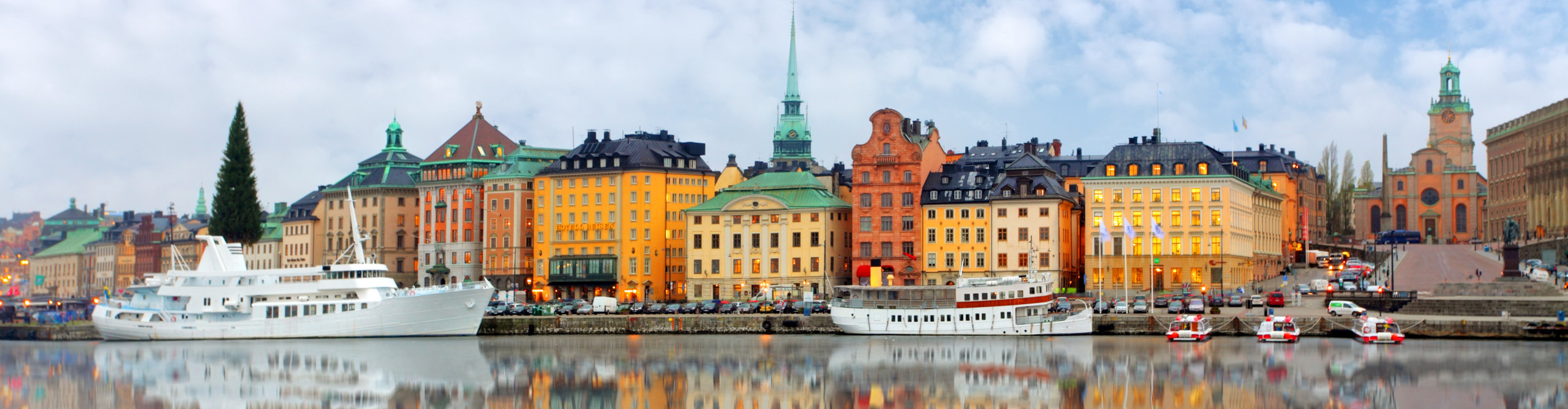 Scenic panorama of the Old Town pier architecture in Stockholm, Sweden, on a cloudy