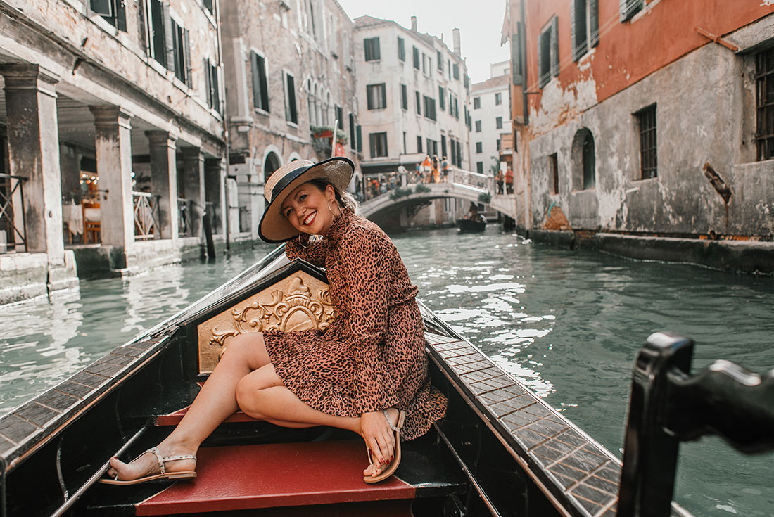 Traveller enjoys gondola ride in Venice
