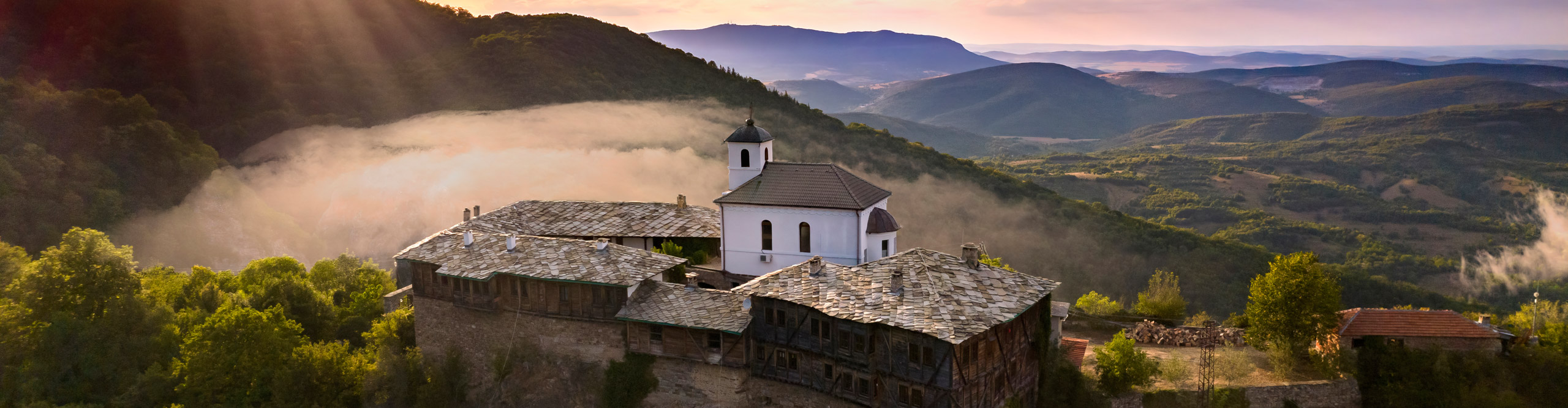 Aerial view of Medieval Glozhene Monastery of Saint George, Lovech region, Bulgaria at sunset