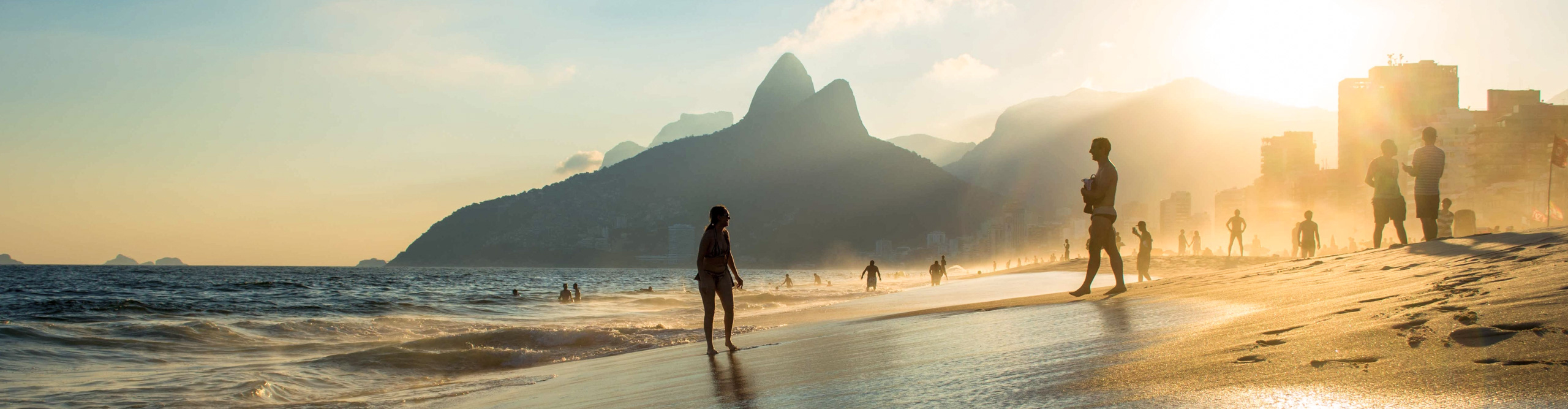 Sunset over Rio's beaches and mountains on a misty day