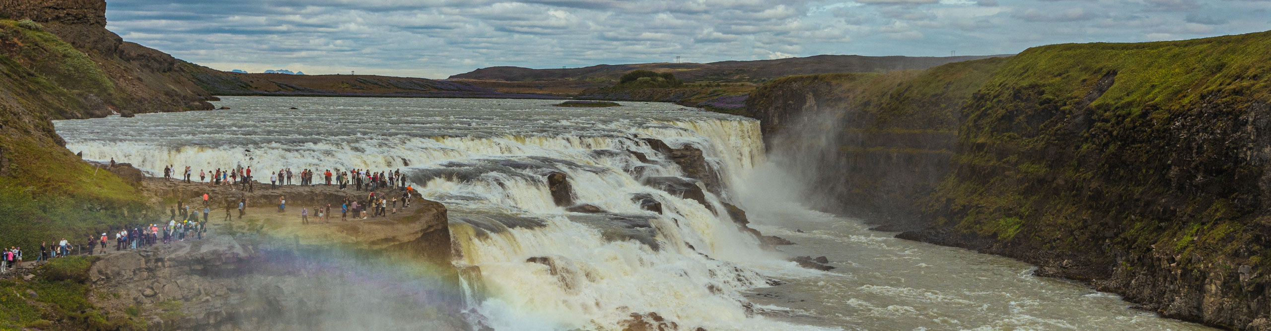 The flowing waters of the Gullfoss Goldenfalls on a cloudy day, Iceland 