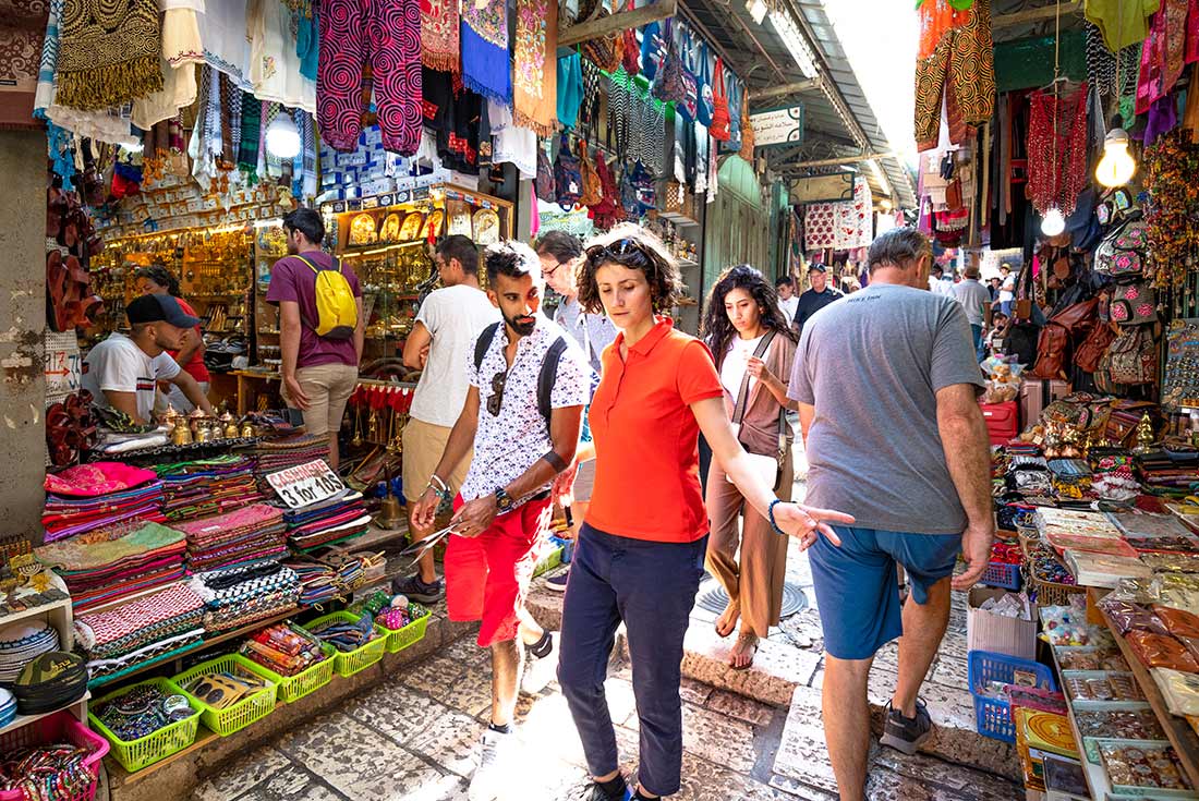 Leader and group in the Old City Market of Jerusalem