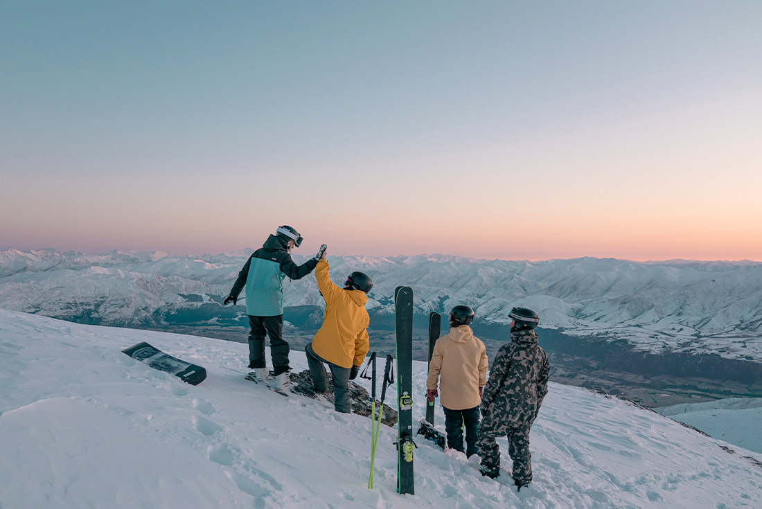 Group at the top of the run at sunset, The Remarkables, South Island, New Zealand