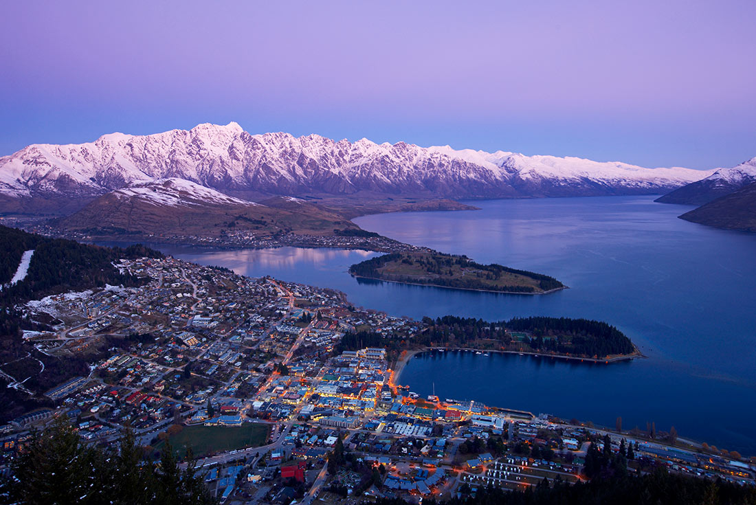 Queenstown in the twilight with the Remarkable in the background, South Island, New Zealand