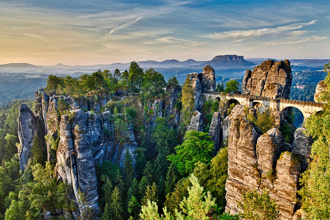 Bastei rock formation with a bridge allowing travellers to approach some of the stones
