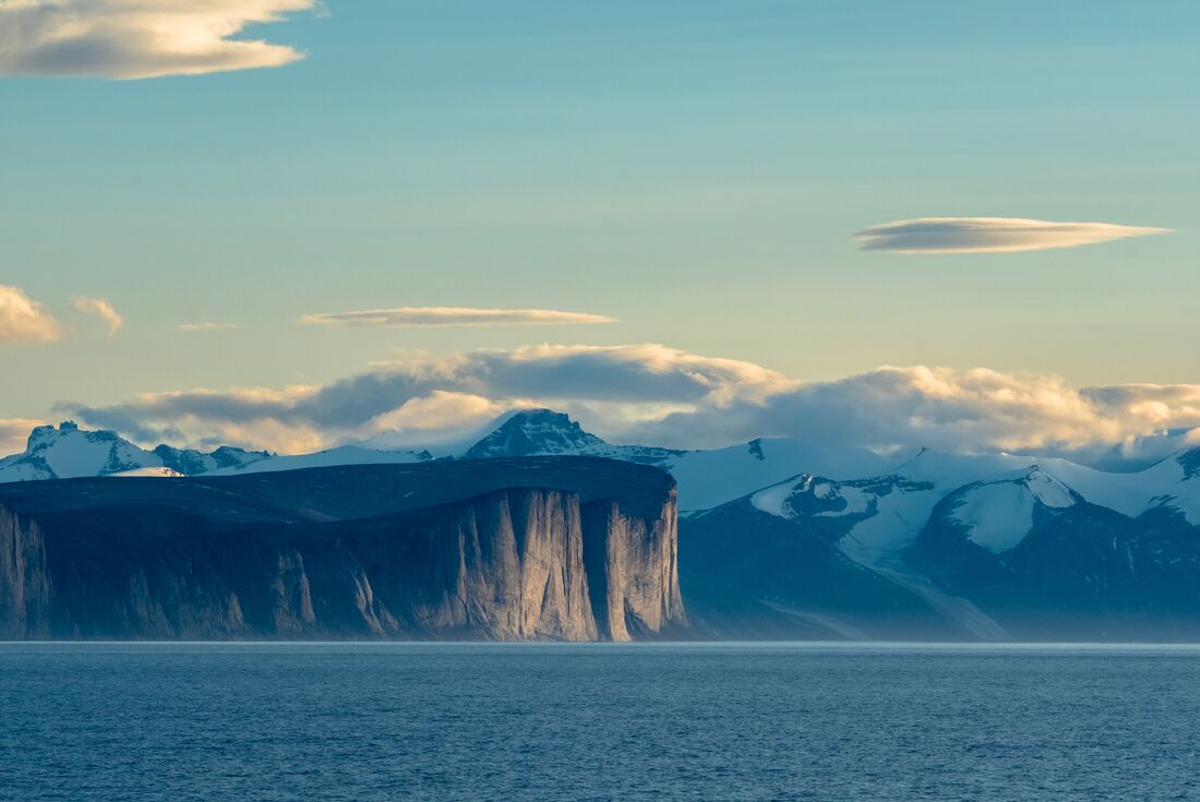 Mountainous landscapes of Sam Ford Fjord seen from the water
