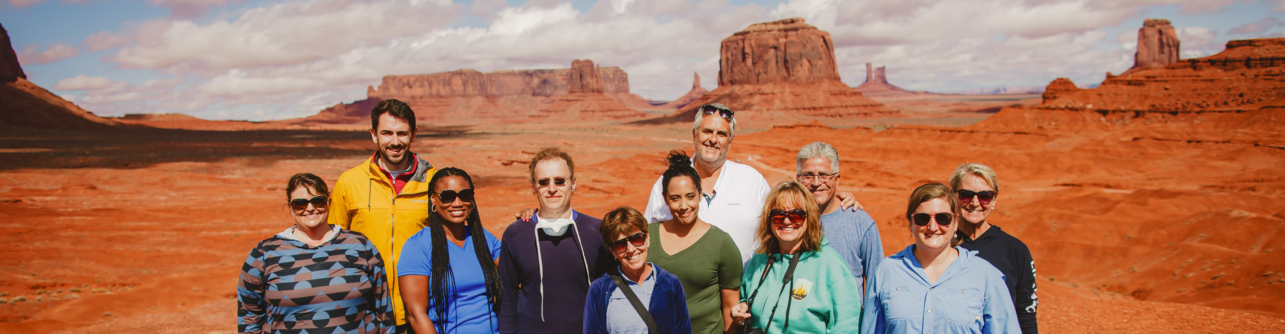 Group at Monument Valley on a clear sunny day, USA