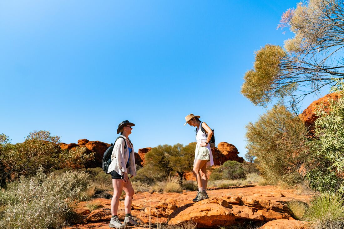 travellers hiking in the Red Centre, Australia