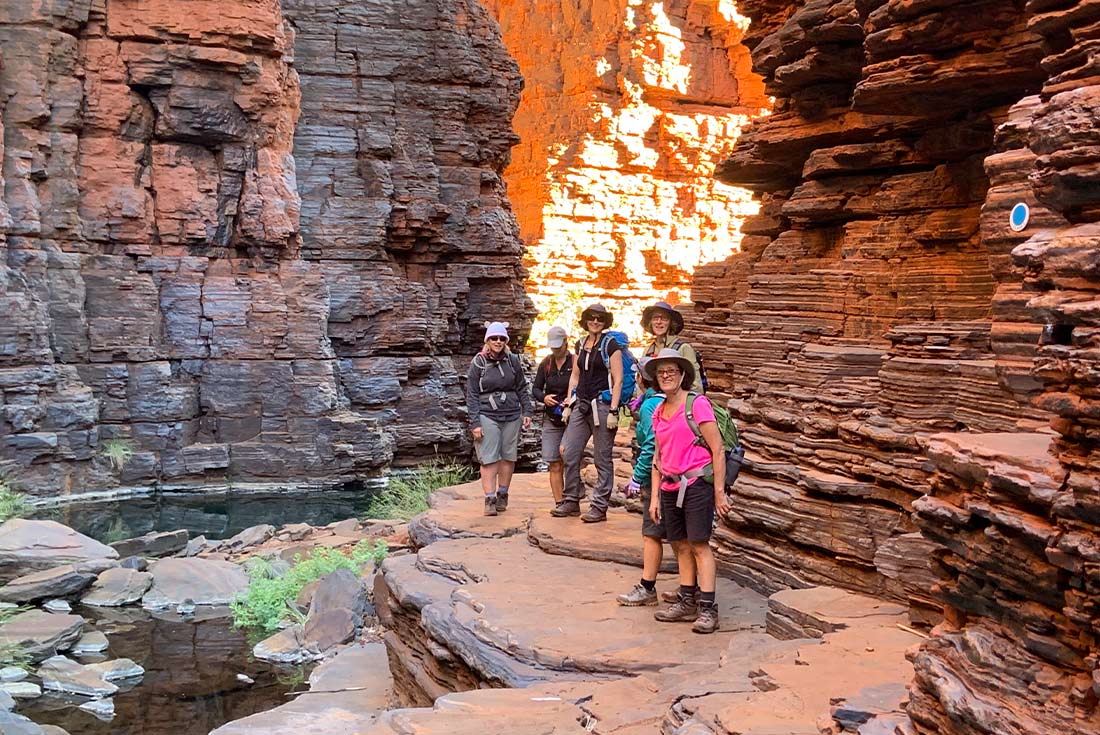 Walking group in Karijini Gorge, Western Australia