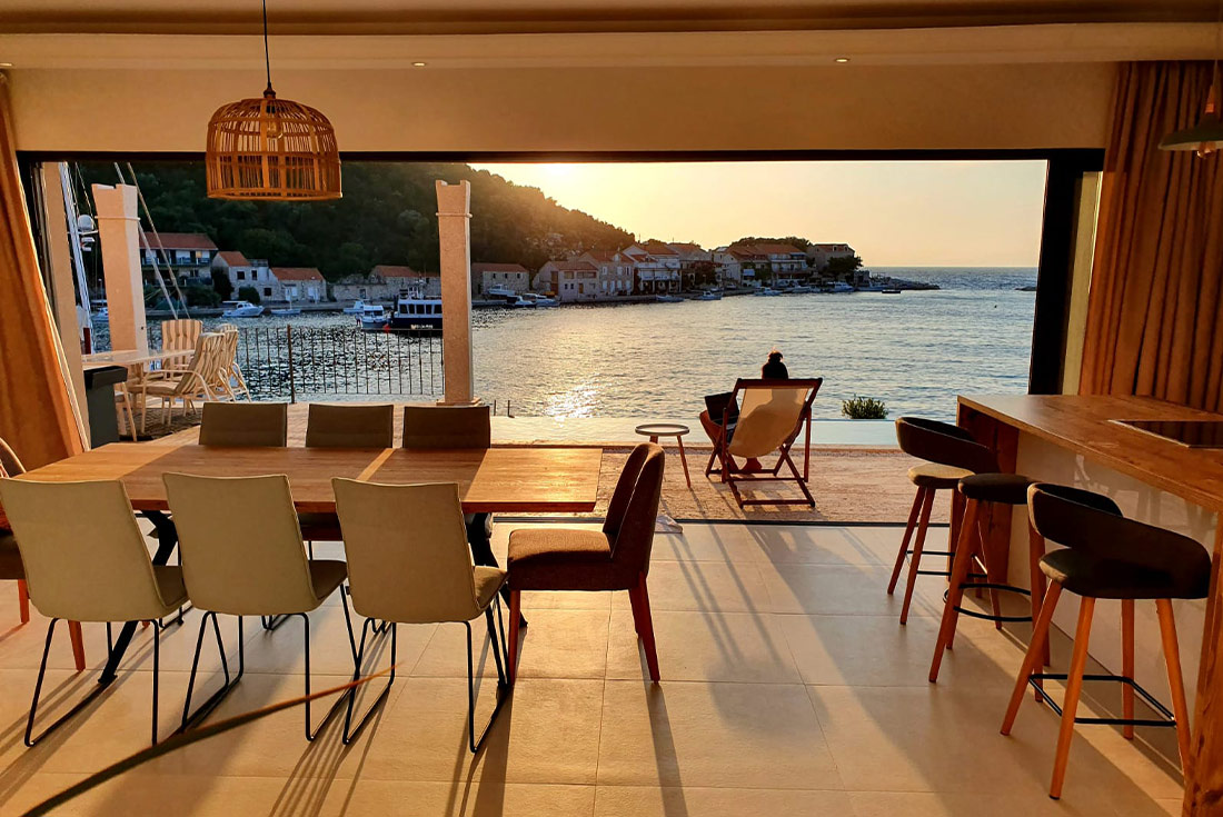 Lastovo Island Feature Stay: Lounging in common area during golden hour