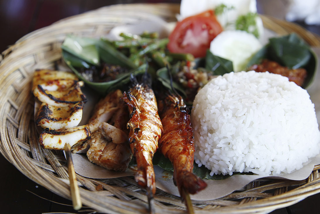 A close up look at a traditional Balinese bbq plate