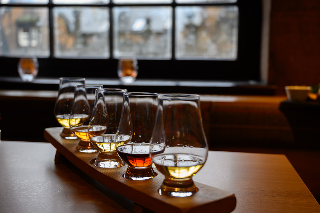 Flight of whisky at a whisky distillery, Scotland