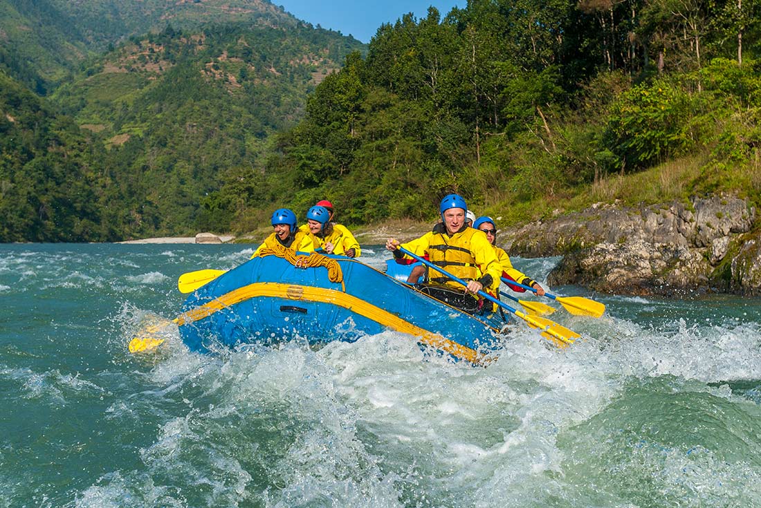 Travellers white water rafting on Tripoli River, Nepal