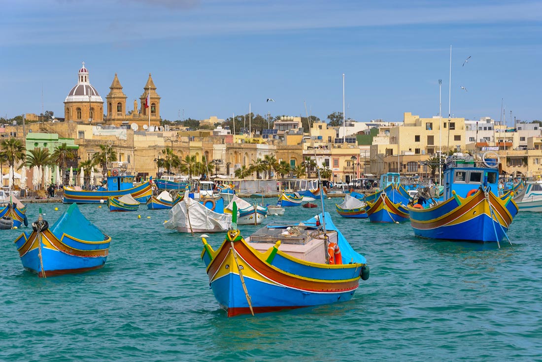 Colorful fishing boats on the Marsaxlokk Harbor, Malta