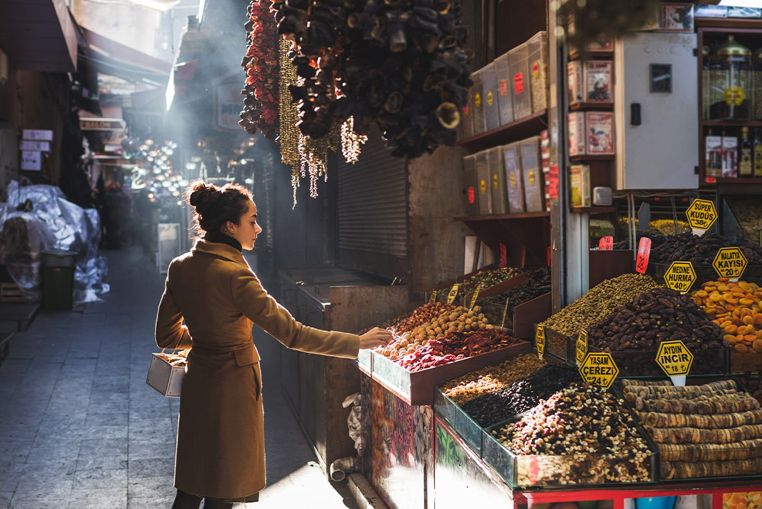 Woman shopping in the Grand Bazaar, Istanbul, Turkey