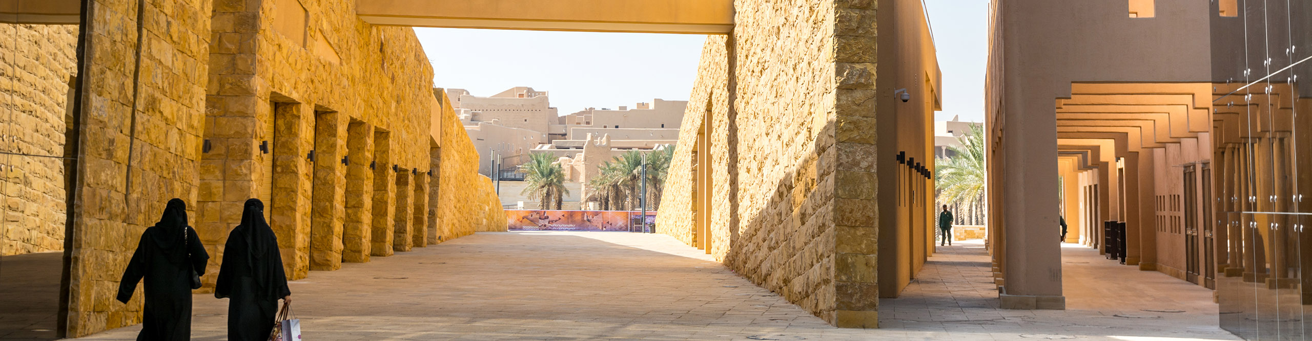 Arabic women walking in the Diraiyah, a town in Riyadh, Saudi Arabia, 