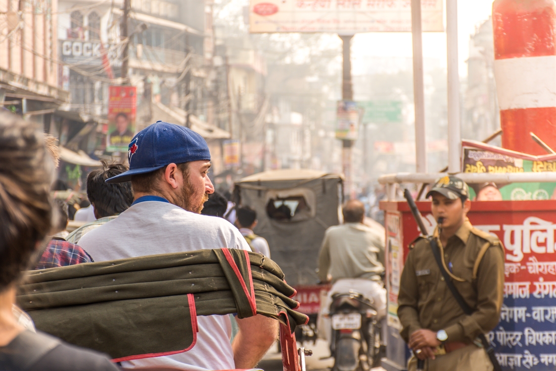 india varanasi traveller in rickshaw