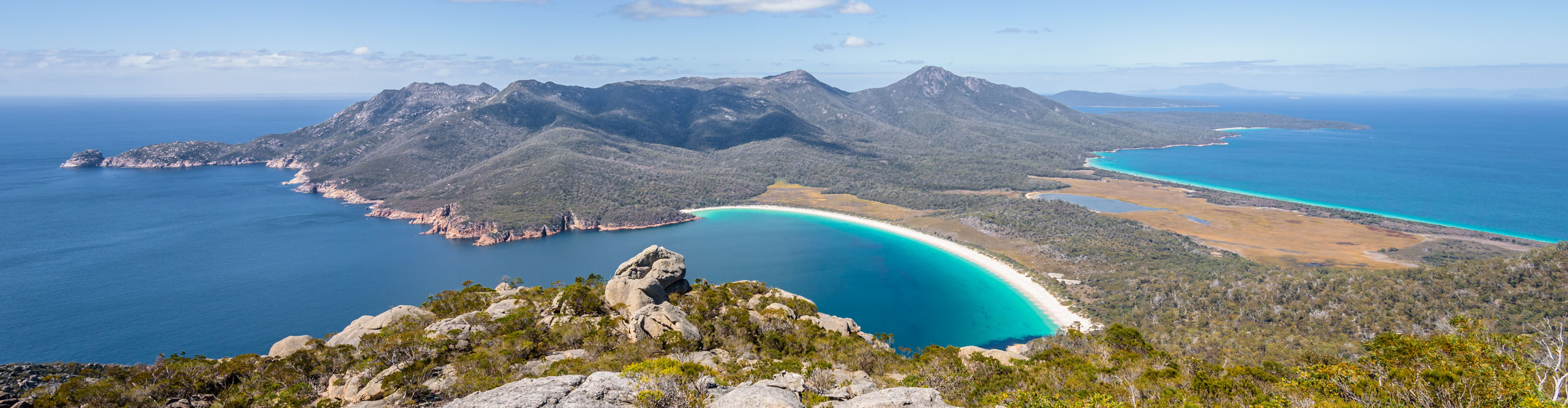 Aerial view of Wineglass bay on a clear sunny day, Tasmani, Australia 