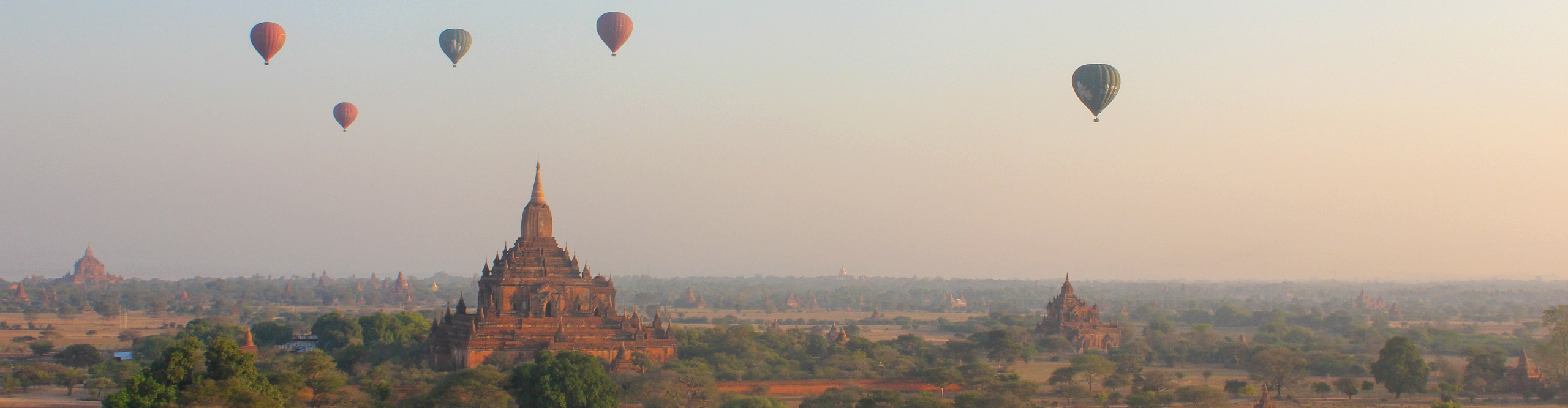 Bsllons in the sky over the temples on a misty morning, in Bagan, Myanmar Burma 