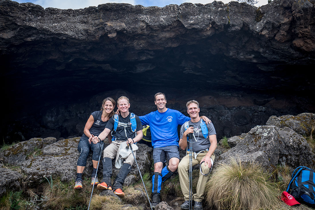 Hikers take a break along the Mount Kilimanjaro trail