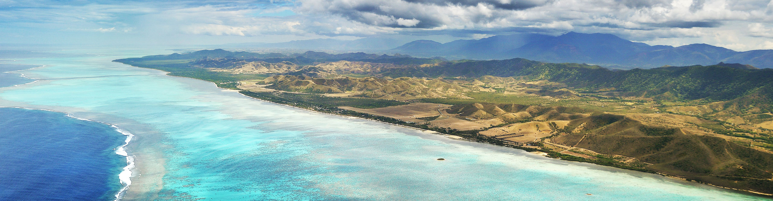 Aerial view of Deva Mountains and the Reef Lagoon at Poe in New Caledonia 