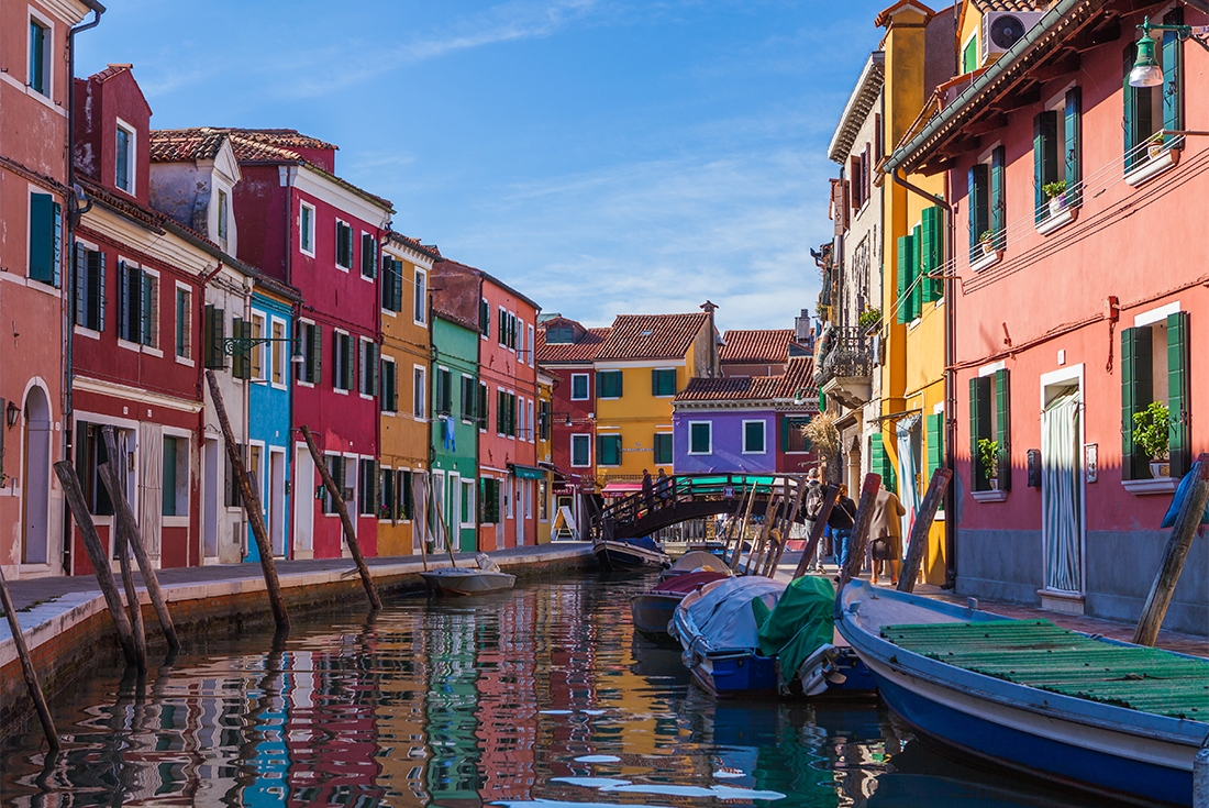 Enjoy the lively streets along Venice's canals