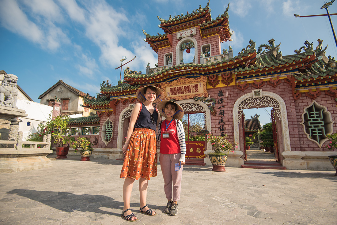 Travellers in front of the Quan Cong Temple in Hoi An, Vietnam on an Intrepid Travel tour.