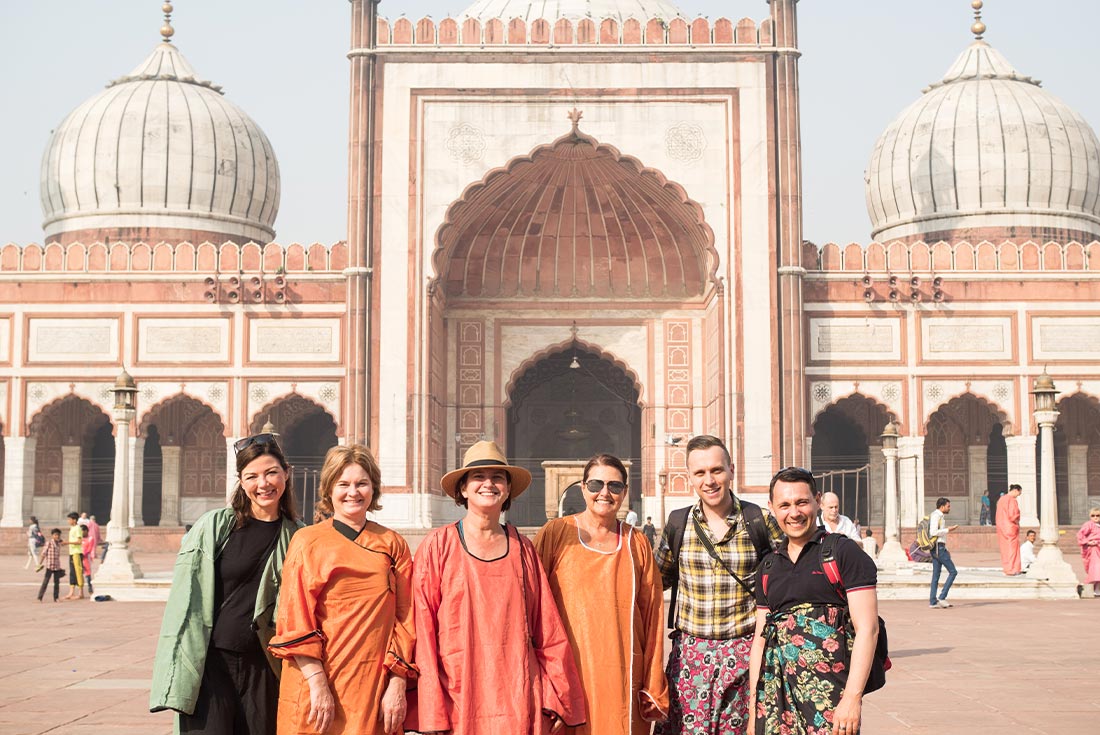 Group of travellers standing in front of Jama Masjid, Delhi, India