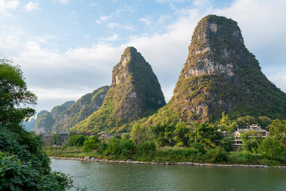 Limestone towers beside the river in Yangshuo, China