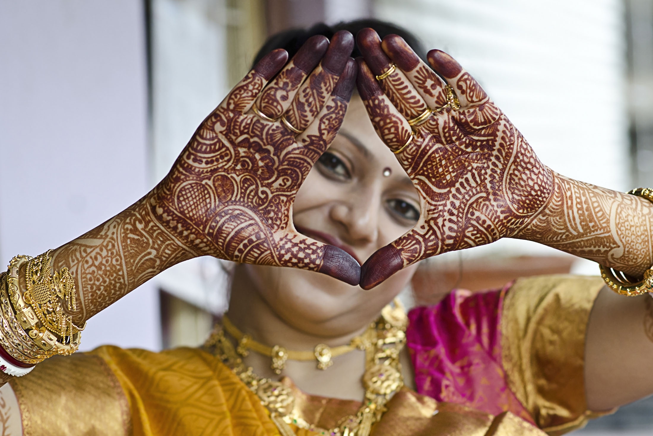 Bengali Woman with beautiful mehendi design on hand