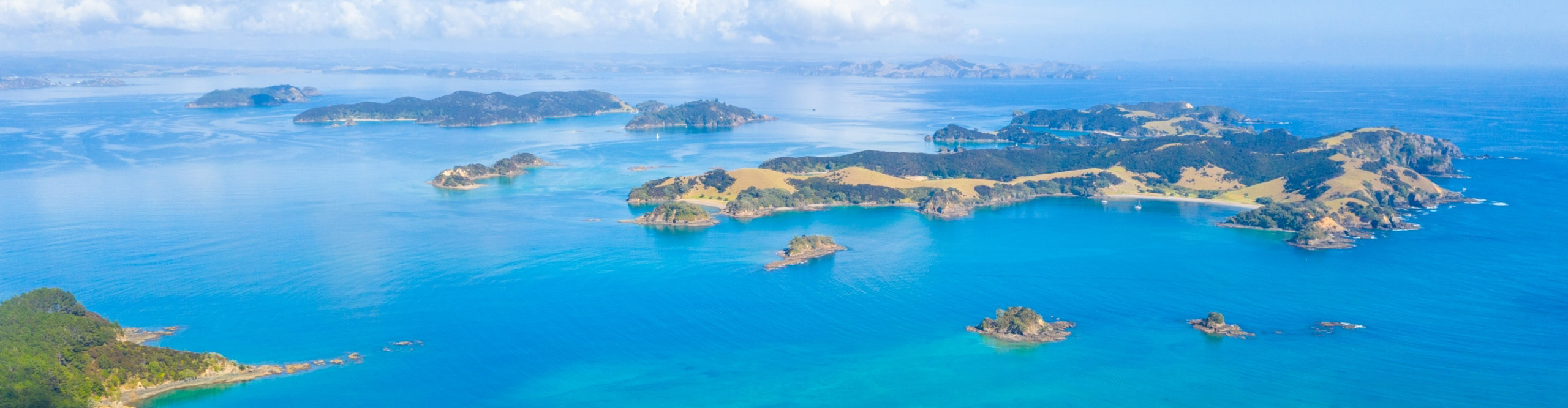 Aerial view. of the bay of islands on a clear sunny day, North Island, New Zealand
