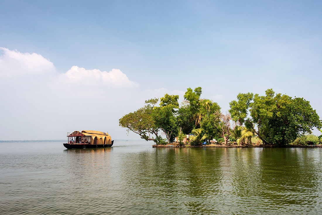 HHPS - Traditional houseboat floating on the Kerala Backwaters