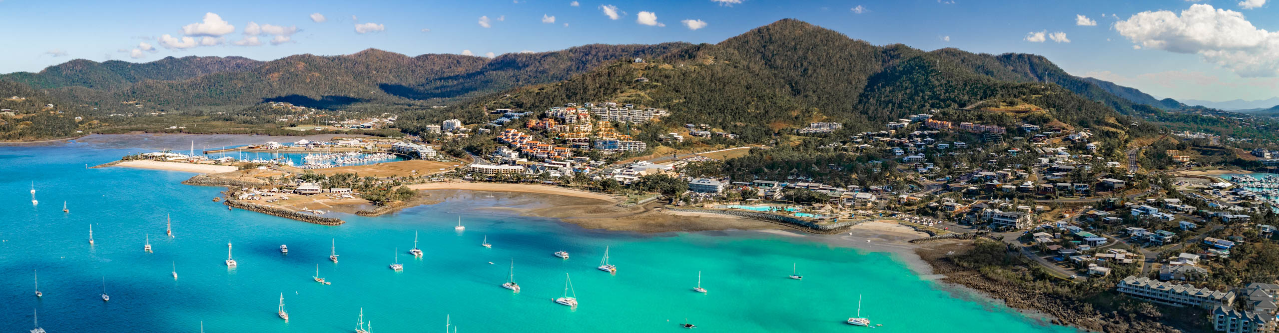 Aerial view of Airlie Beach, with a beautiful blue sky, Queensland 