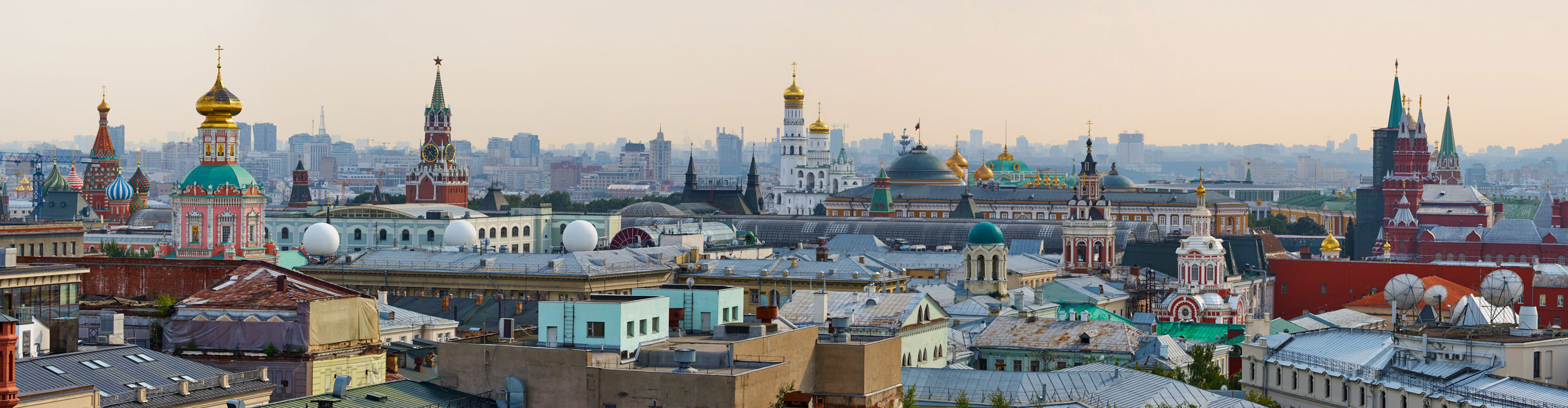 View of rooftops in the center of Moscow overlooking the Kremlin at dusk