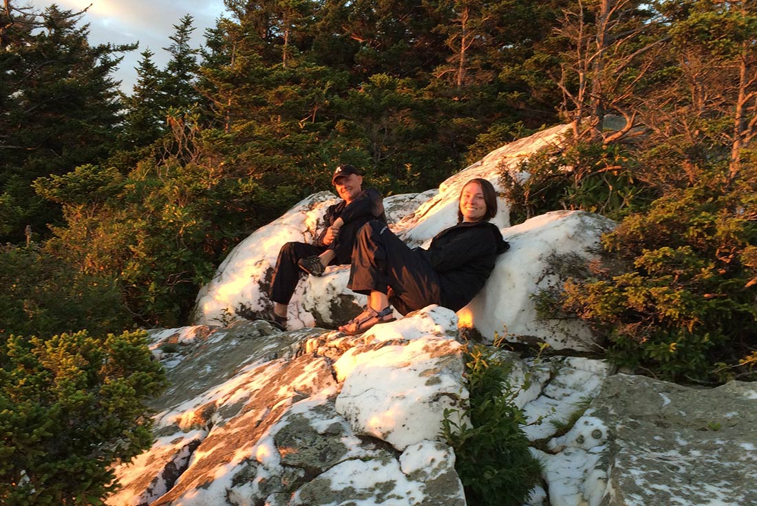 Travellers relaxing after trekking through Shining Rock, North Carolina, USA