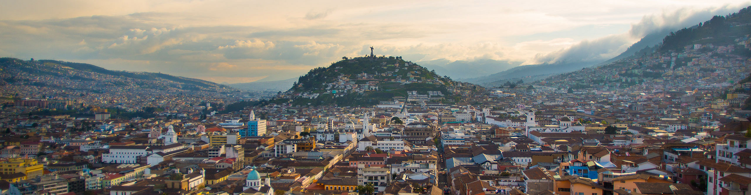 The skyline of historic city of Quito, at sunset, Ecuador