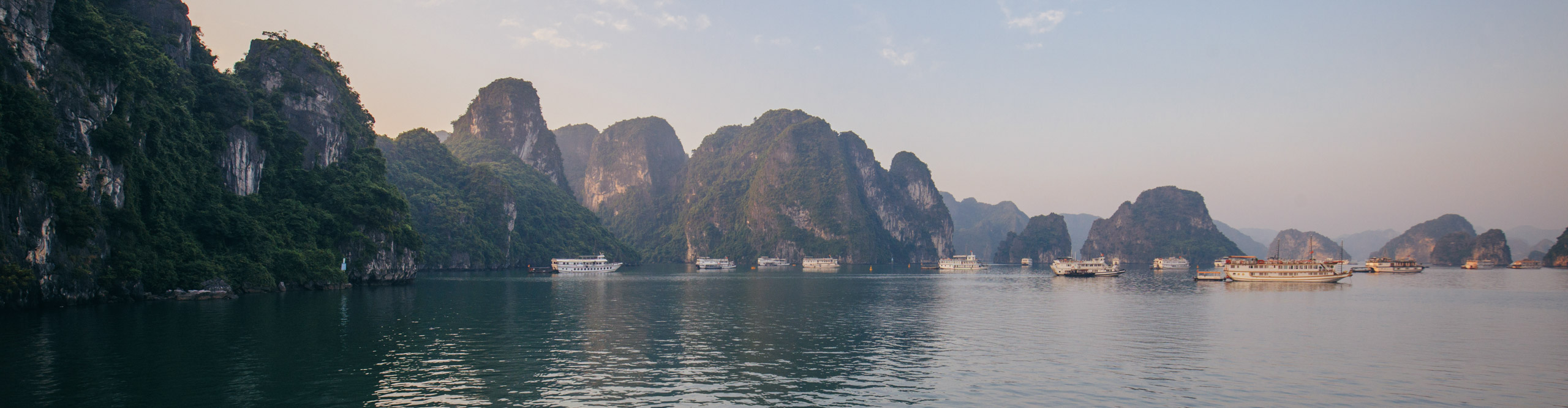 Lat afternoon sun over the islands of Halong bay, Vietnam
