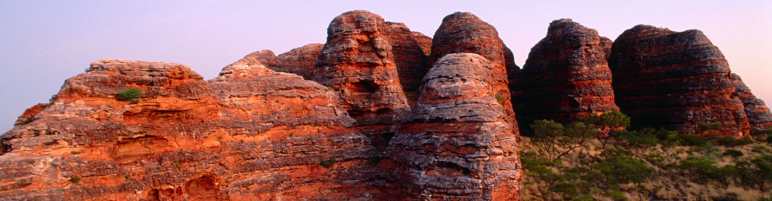 Sunset at the bungle bungles, turning the rocks a deep red colour, Western Australia
